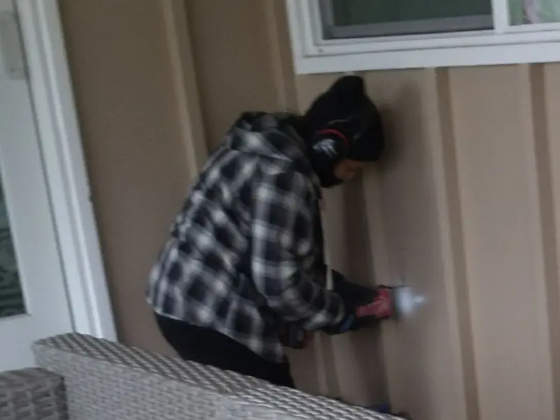Professional electrician installing an exterior outlet in Hillview