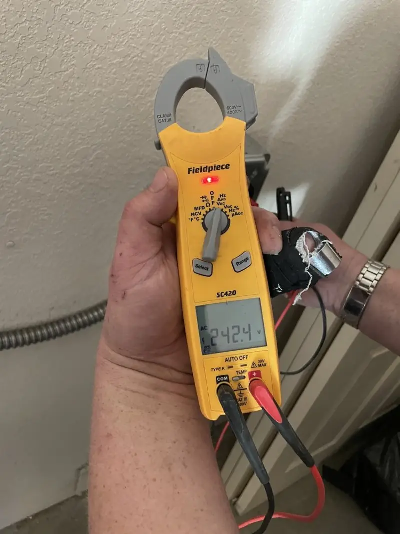 Voltage testing with clamp meter during Recessed Lighting Installation in Hillview